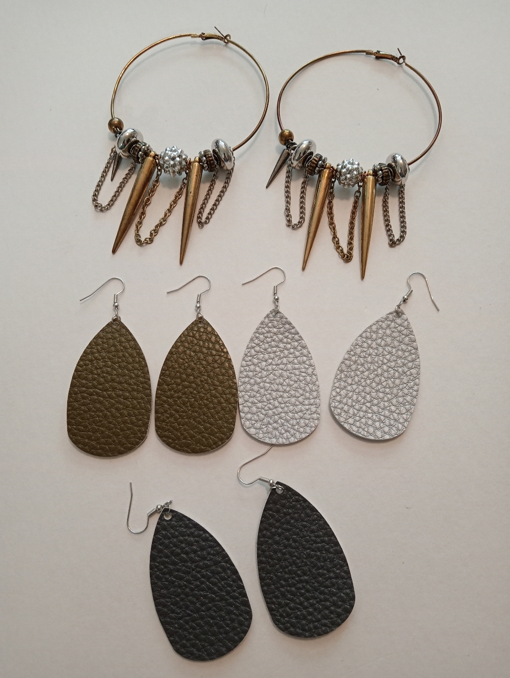 #1195.  4 Piece Assorted,Silver & Gold Toned, Faux Leather Earring Bundle